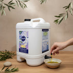 Adelaide Hills Harvest 2L garlic infused extra virgin olive oil in a white plastic drum with a tap on a wooden table.